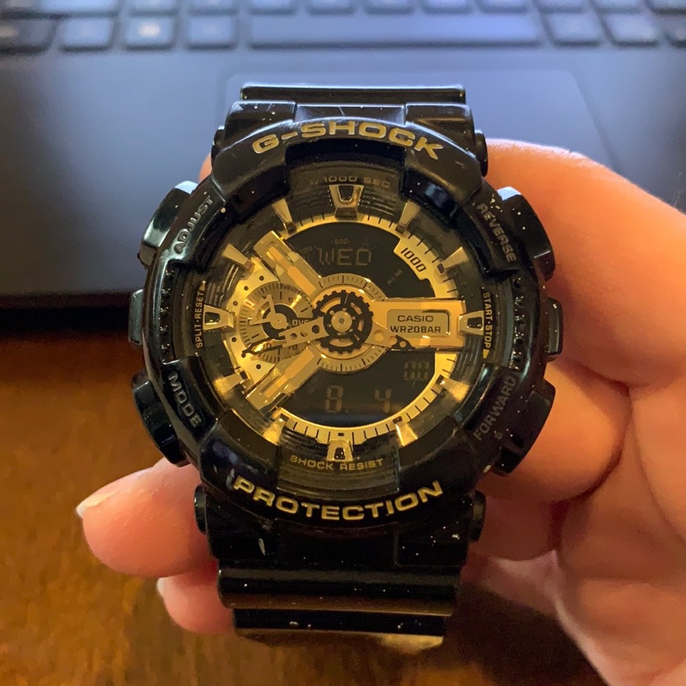 Fairly new black and gold g shock